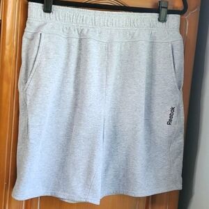REEBOK GRAY MENS SWEAT SHIRT SHORTS. Size large. Elastic and tie. 3 pock…